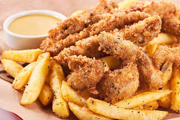 chicken and chips with dipping sauce