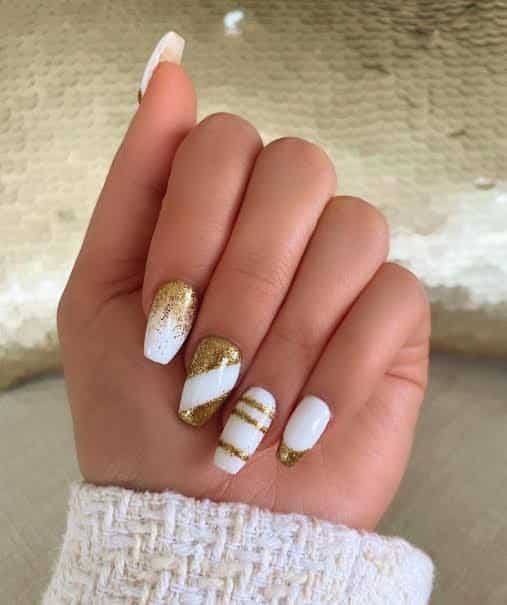 White and gold nails