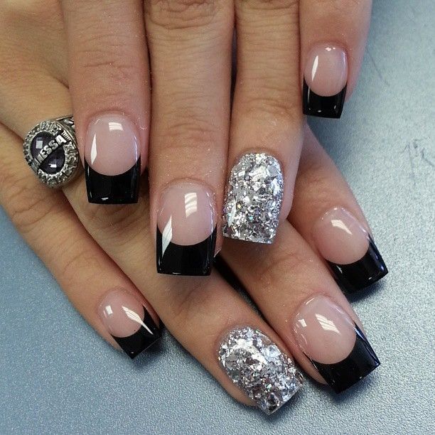 Black French tips with silver glitter accents