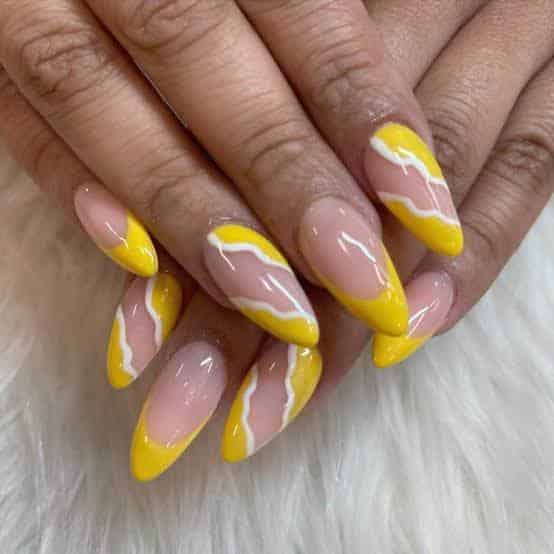 Yellow and white nails design
