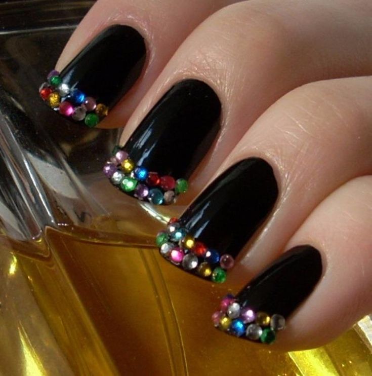 Black French tips with rhinestone accents