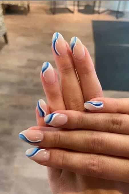 Shades of white and blue nails