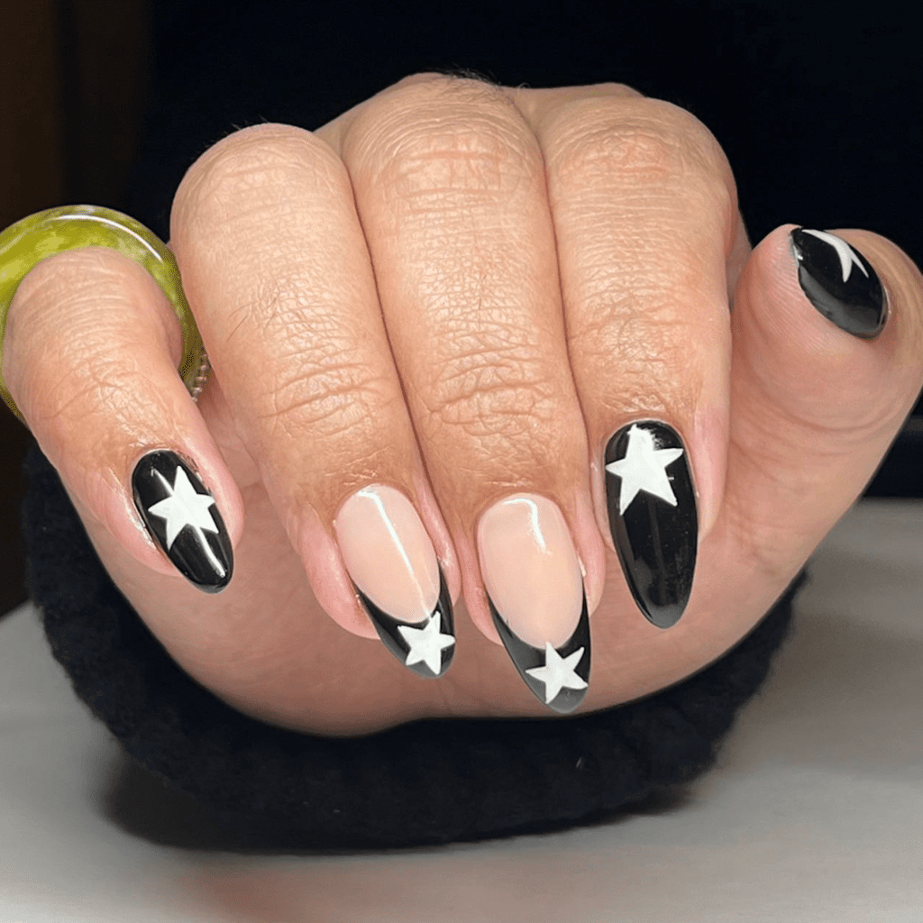 Black French tips with white lace accents
