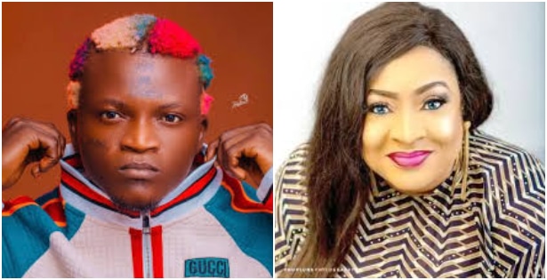 Portable shies away from camera as actress Foluke Daramola insists on taking pictures with him | Battabox.com