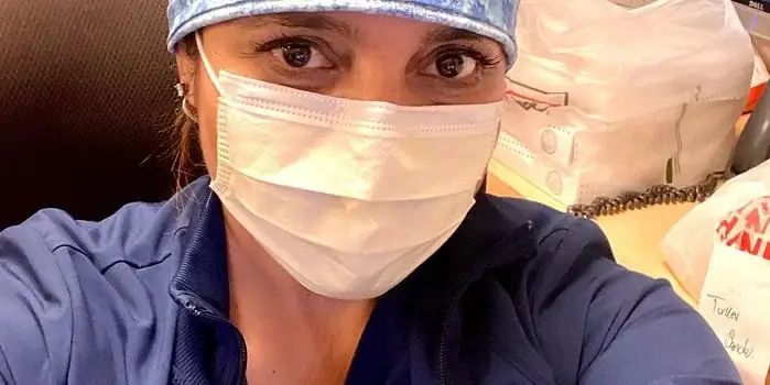 Natalie Ortega in her nurse scrubs