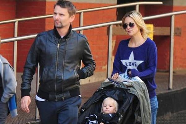 Matt and Kate taking a stroll with baby Bing