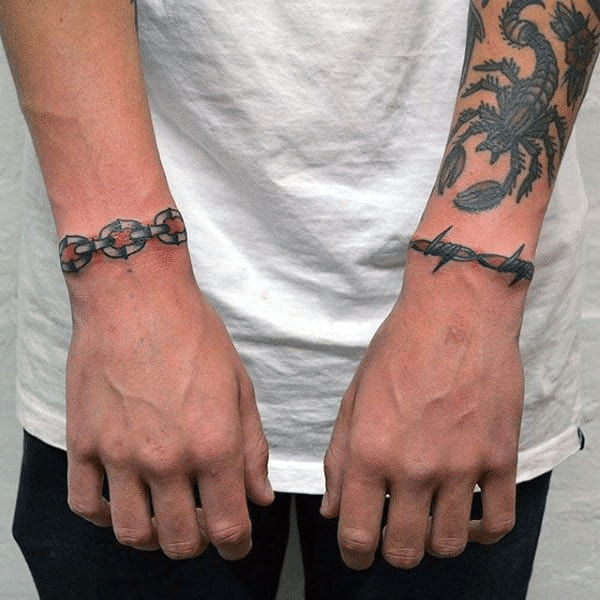 Barbed wire tattoo around the wrist