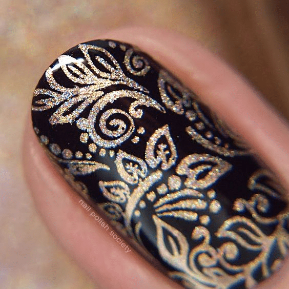 8. Black chrome floral nails
