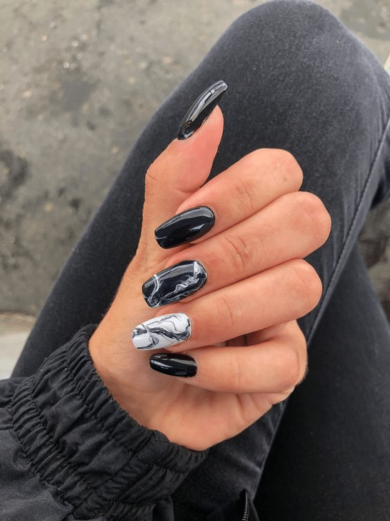 7. Black chrome marble nails