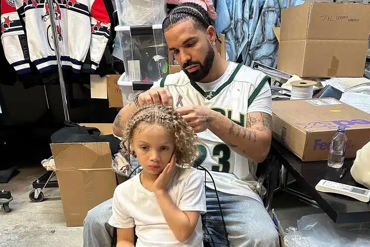 Drake bonding with his son; undoing his son, Adonis' braids 