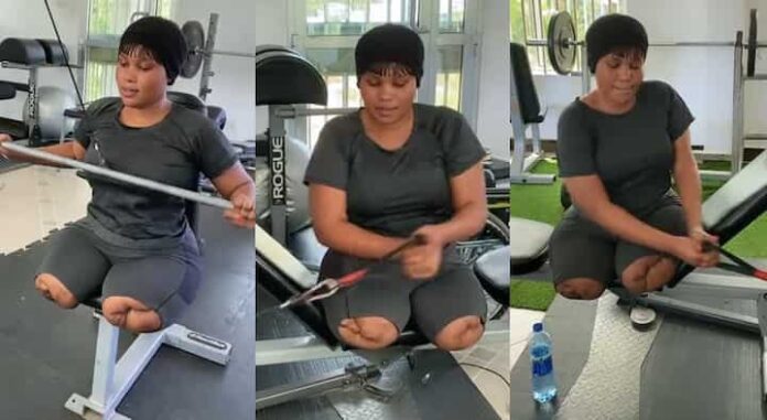 Beautiful physically challenged woman performs exercise at gym | Battabox.com