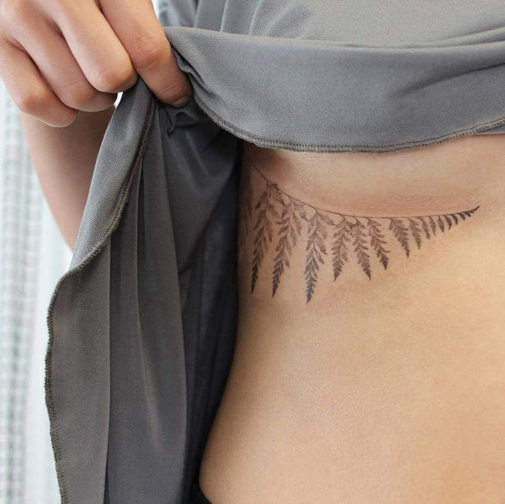 Under breast tattoo design