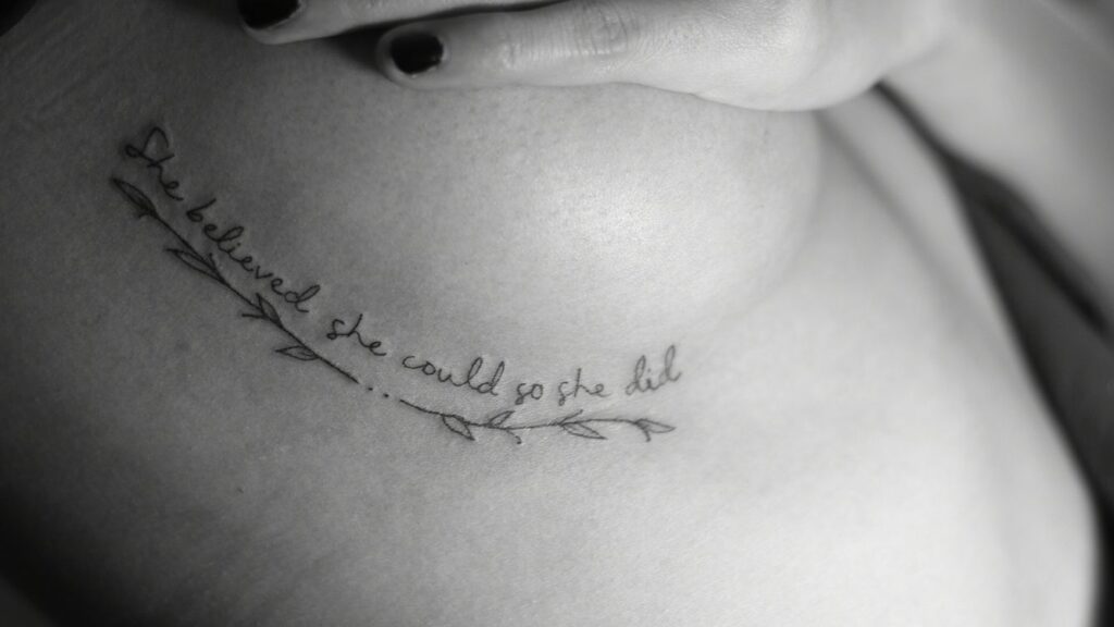 Quotes breast tattoo