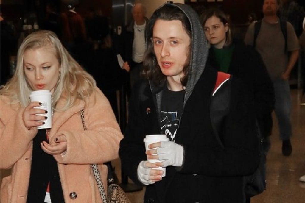 Rory Culkin and his wife.