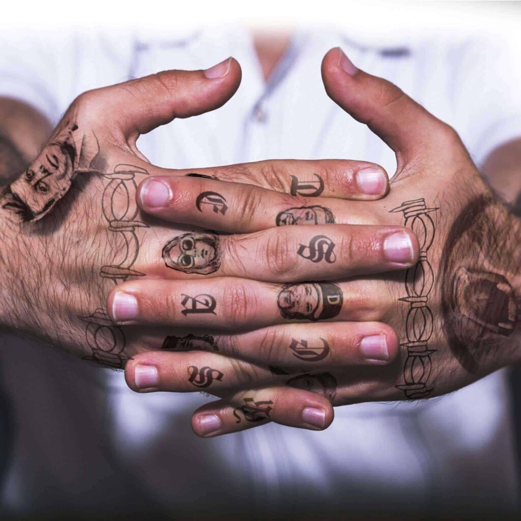 Fingers patchwork tattoo