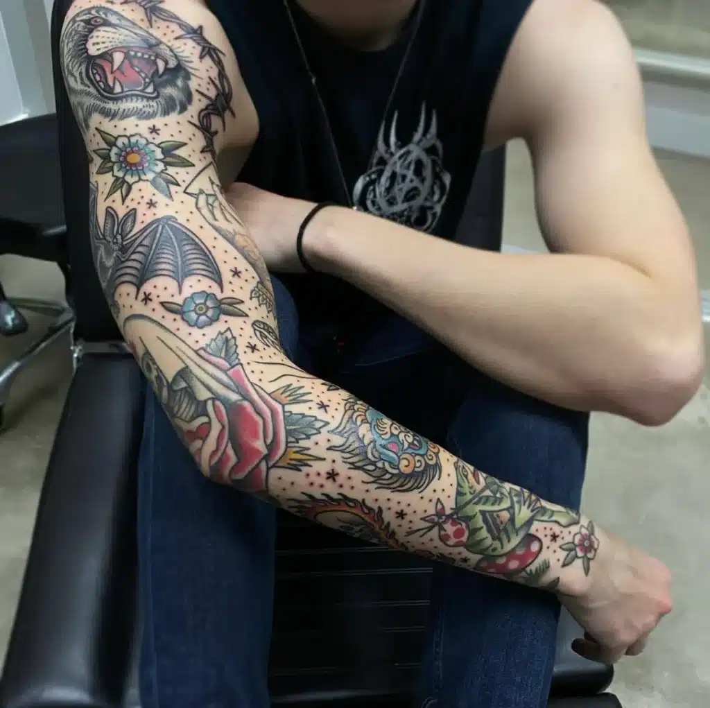 Full sleeve patchwork tattoo