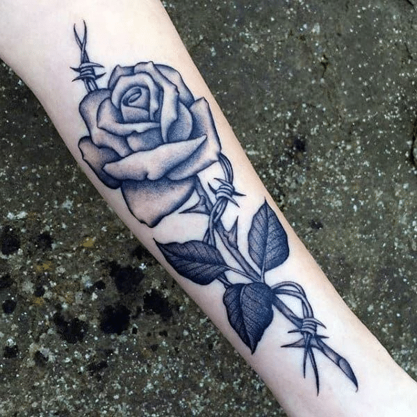 Barbed wire tattoo with a flower