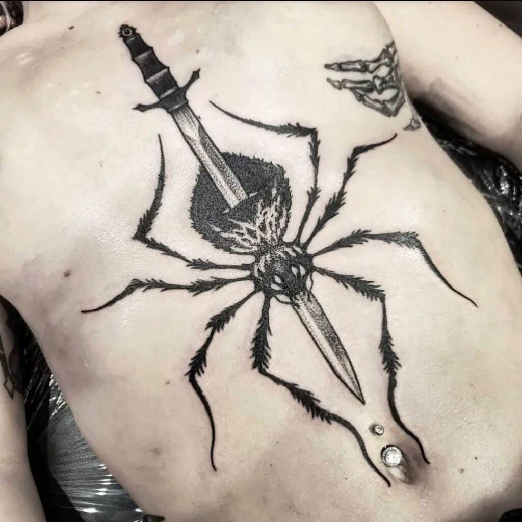 Hanging sternum spider tattoo