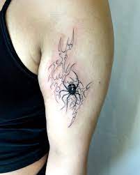 Tribal spider tattoo